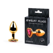 Золотистая анальная пробка с малиновым кристаллом-сердечком - 7 см. - Anal Jewelry Plug - купить с доставкой в Мурманске